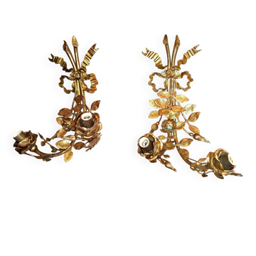 Pair of bronze and gilded metal wall sconces in Louis XVI style