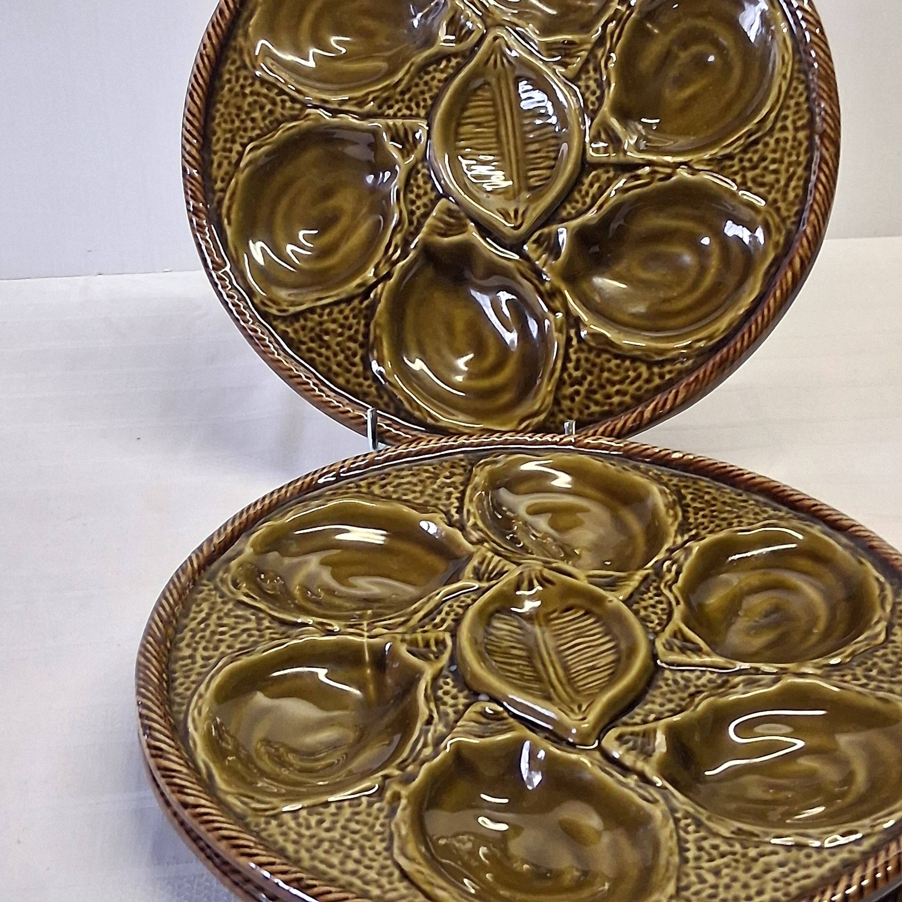 3 green majolica oyster plates from St Clément in good condition.