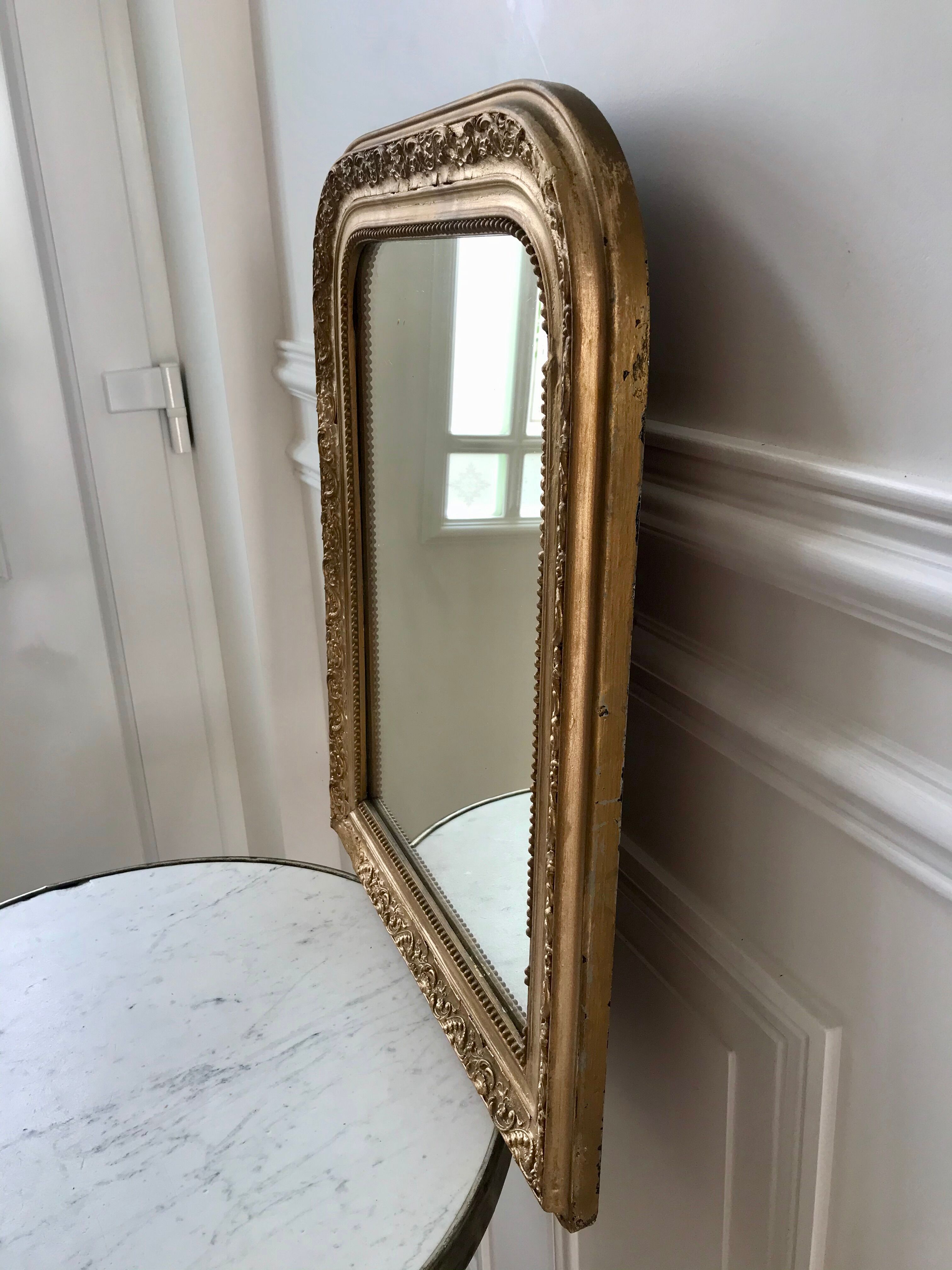 Wooden mirror and gilded stucco early twentieth century