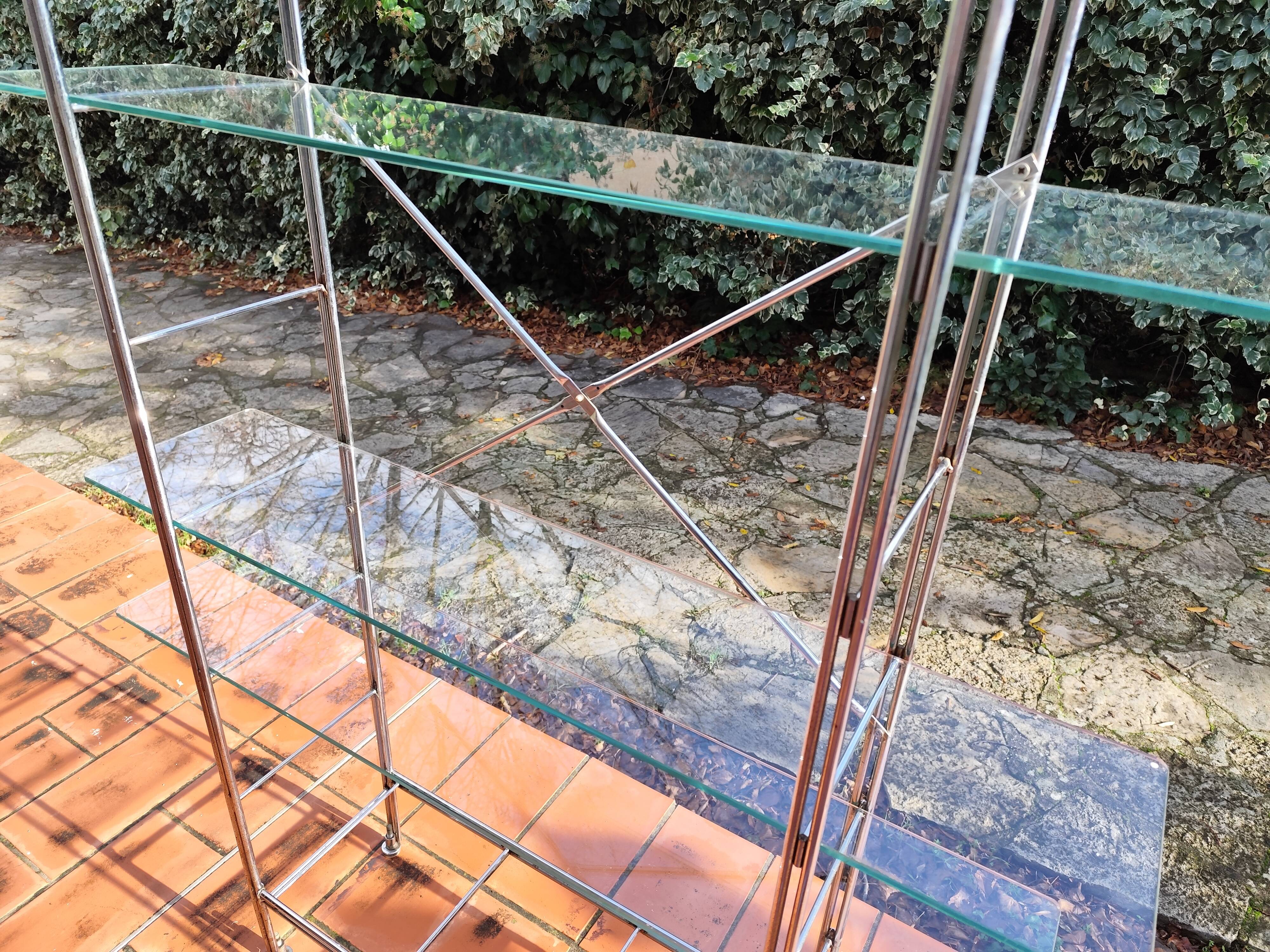 Modular metal chrome and vintage glass shelves from the 1970s.