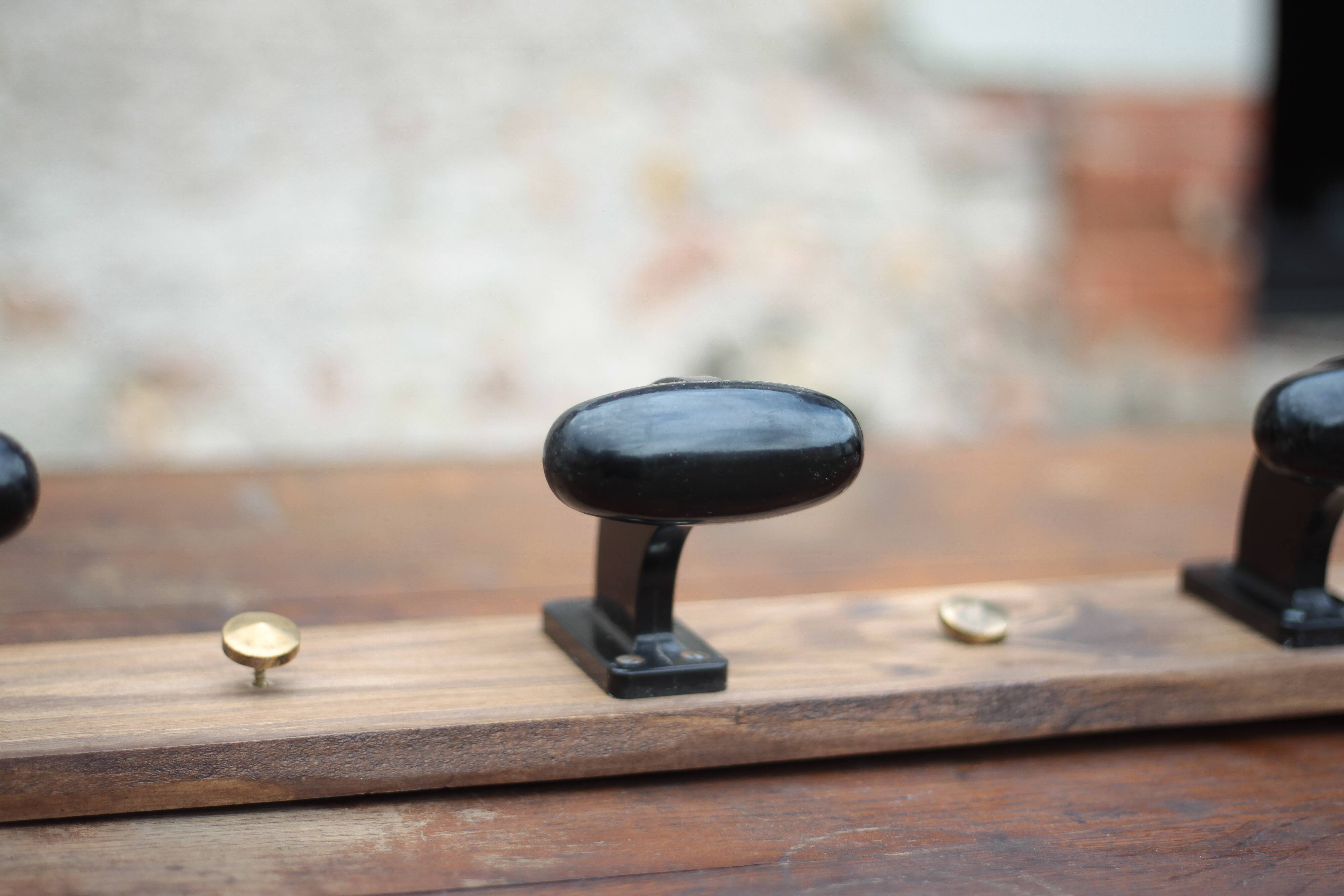 Wooden wall coat rack, vintage wall coat rack, bakelite hooks, ha