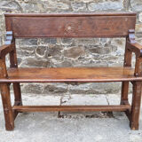 Stylized church pew, early twentieth century, solid wood