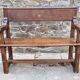 Stylized church pew, early twentieth century, solid wood