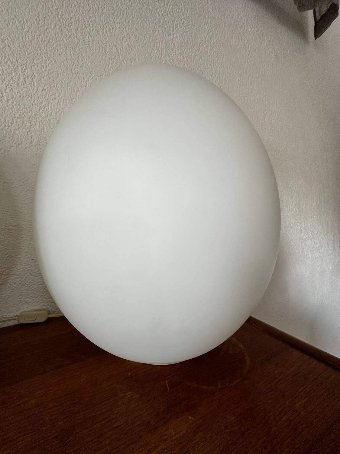 Two opal glass egg lamps