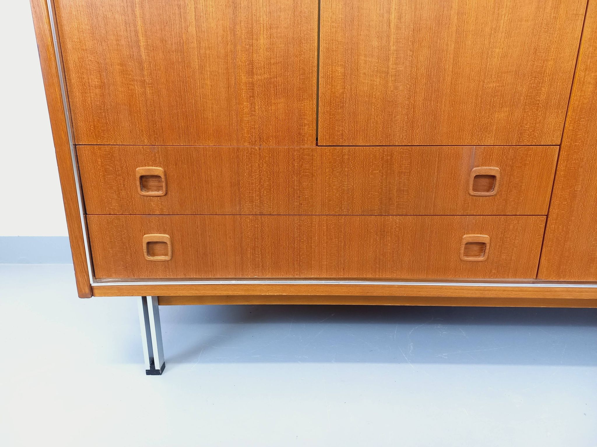 Vintage Scandinavian modernist wardrobe in teak and metal from the 1960s.