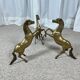 Hollywood Regency style coffee table, 6 patinated brass horses and glass top, 1970.