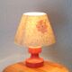 Red wooden lamp with herbarium-style lampshade from the 70s