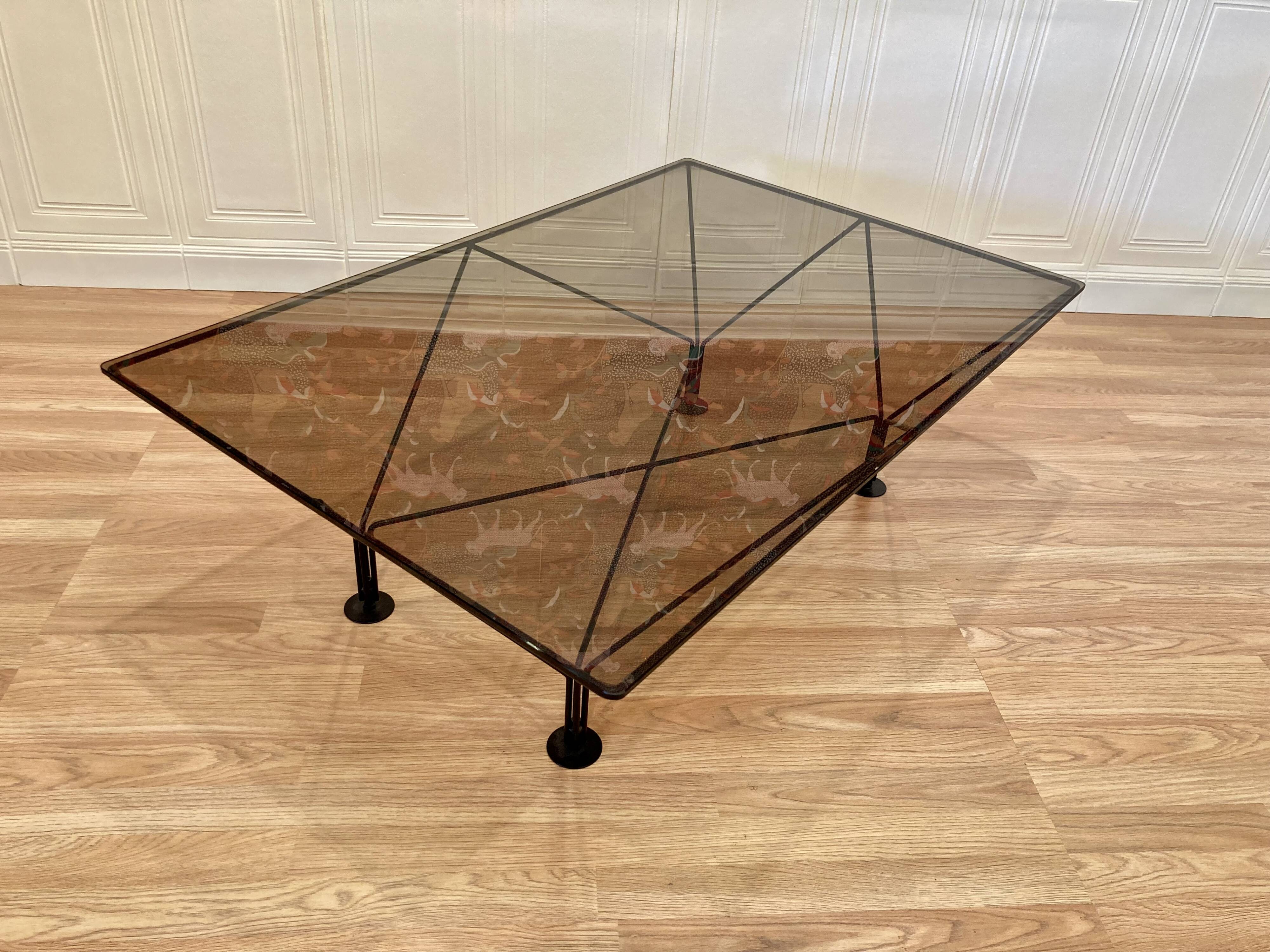 Designer glass and metal coffee table.