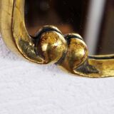 Miroir en bois doré à la feuille