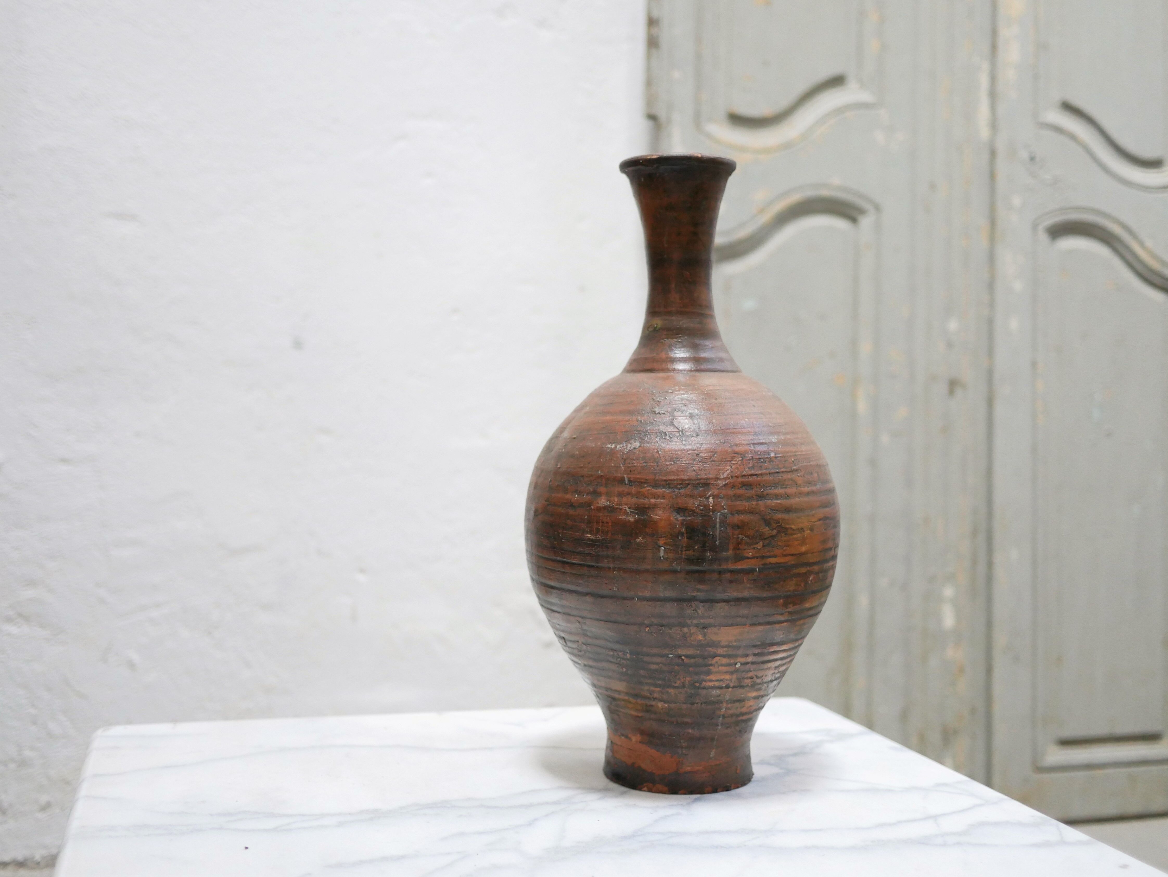Vintage glazed terracotta jar
