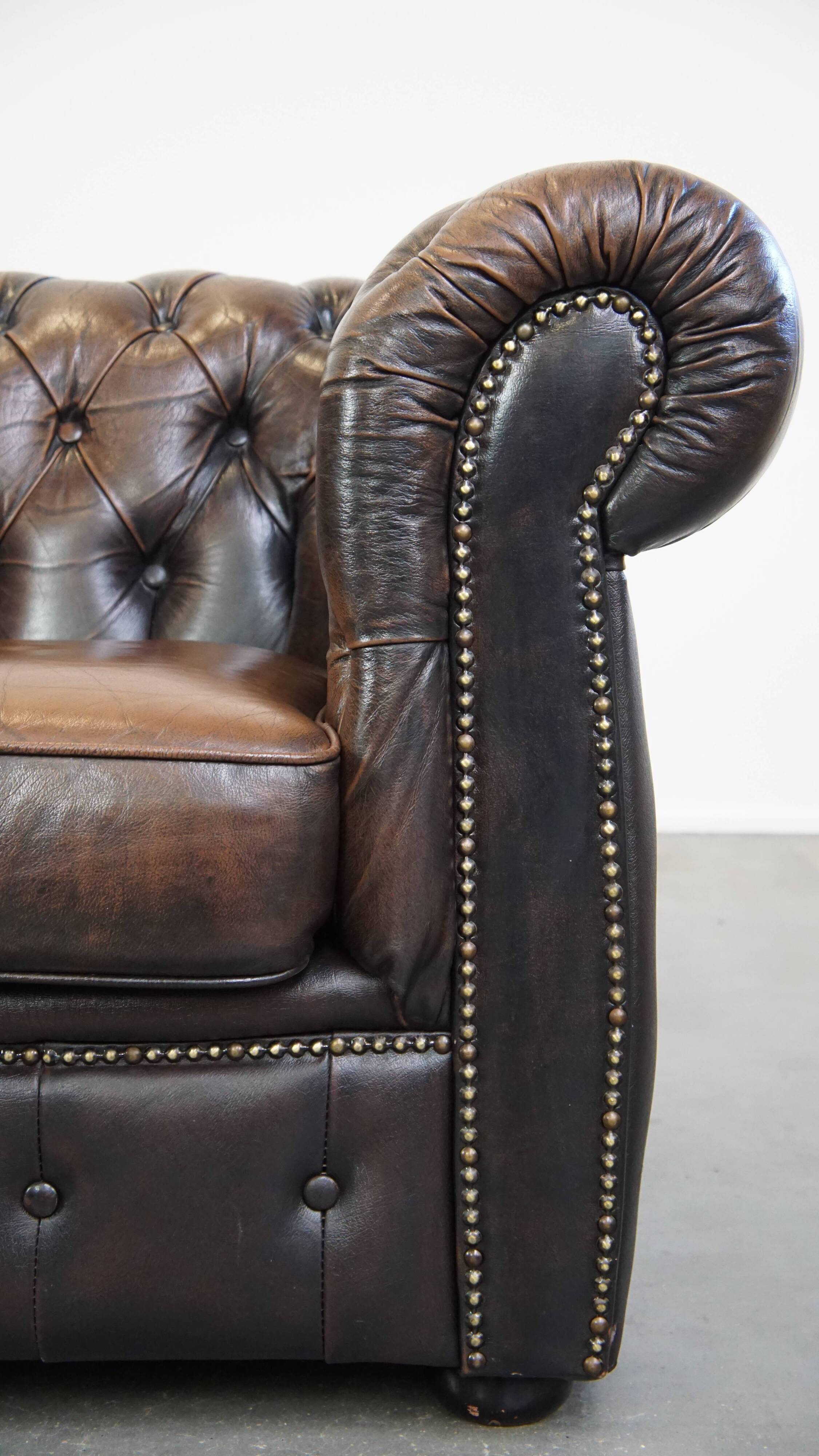 English Chesterfield armchair in sheepskin