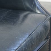 Set of dark blue cow leather club armchairs with a unique design
