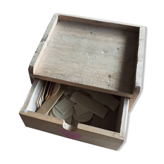 Wooden box with drawer and tokens