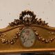 Louis XVI style mirror in wood and gilded stucco 20th century