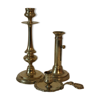 Trio of golden candlesticks