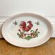 Plat en porcelaine décor coq
