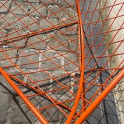 Orange lattice armchair
