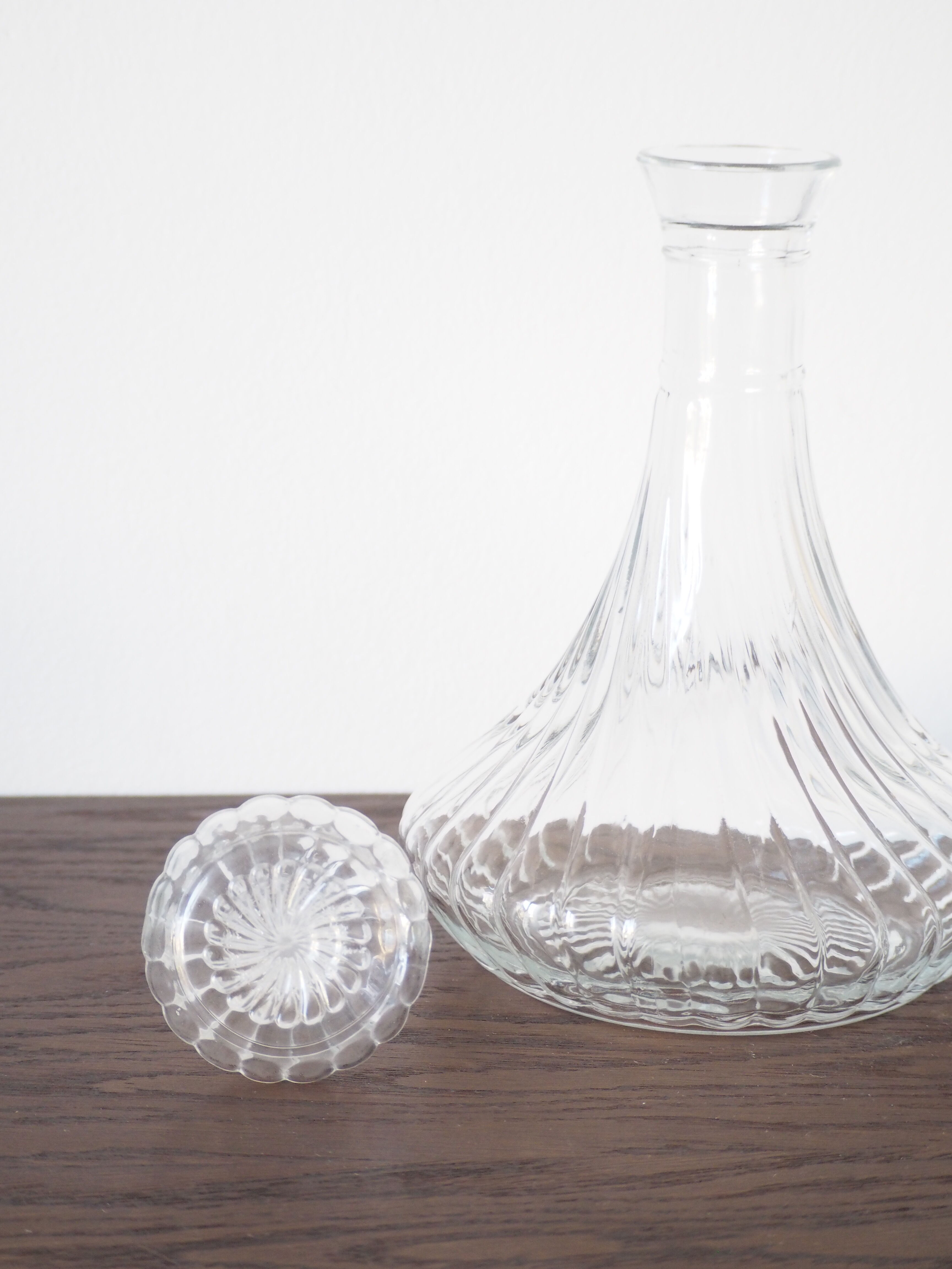 Scrolled glass wine decanter