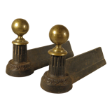 Pair of cast iron and brass chenets