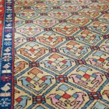 Colorful oriental runner with contrasting borders and cozy patterns, measuring 314x92 cm