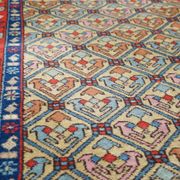 Colorful oriental runner with contrasting borders and cozy patterns, measuring 314x92 cm