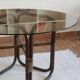 Round dining table in rattan, smoked glass top, 1970s.