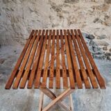 Vintage folding garden table in pine, mid-20th century.