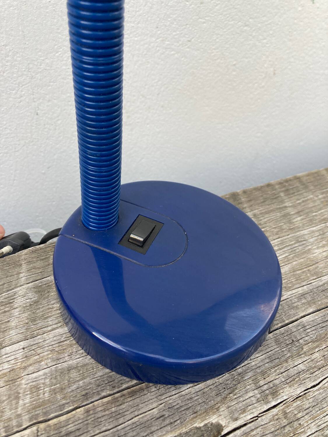 Articulated blue metal bedside lamp