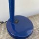Articulated blue metal bedside lamp