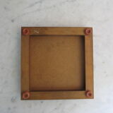 Underside of flat, wooden and faience, in good condition.