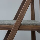 Walnut chair designed by Martin Gillis Studio