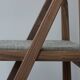 Walnut chair designed by Martin Gillis Studio