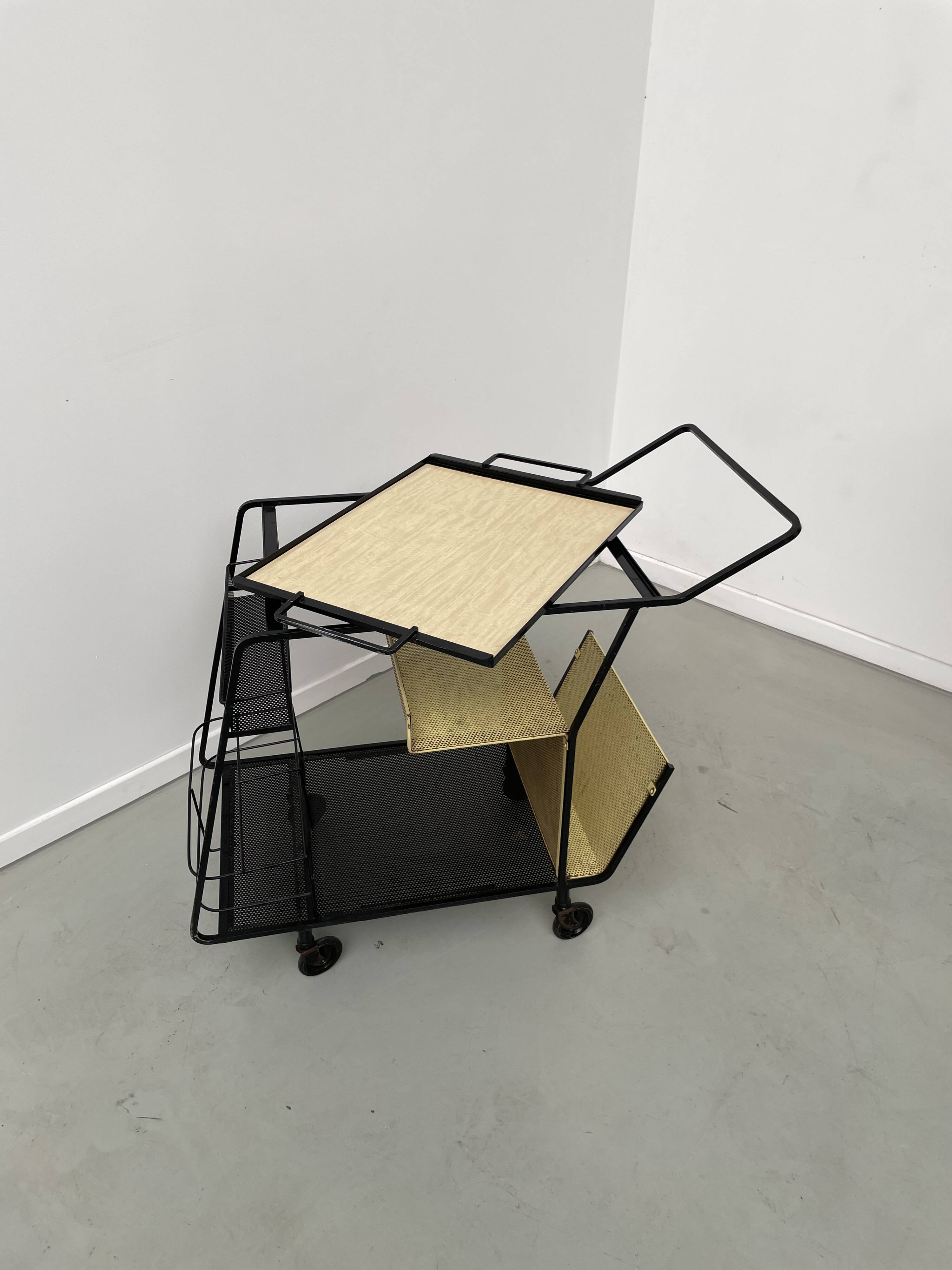 Perforated metal serving trolley in the Mathieu Matégot style