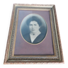 Old photo portrait framed in wood and stucco