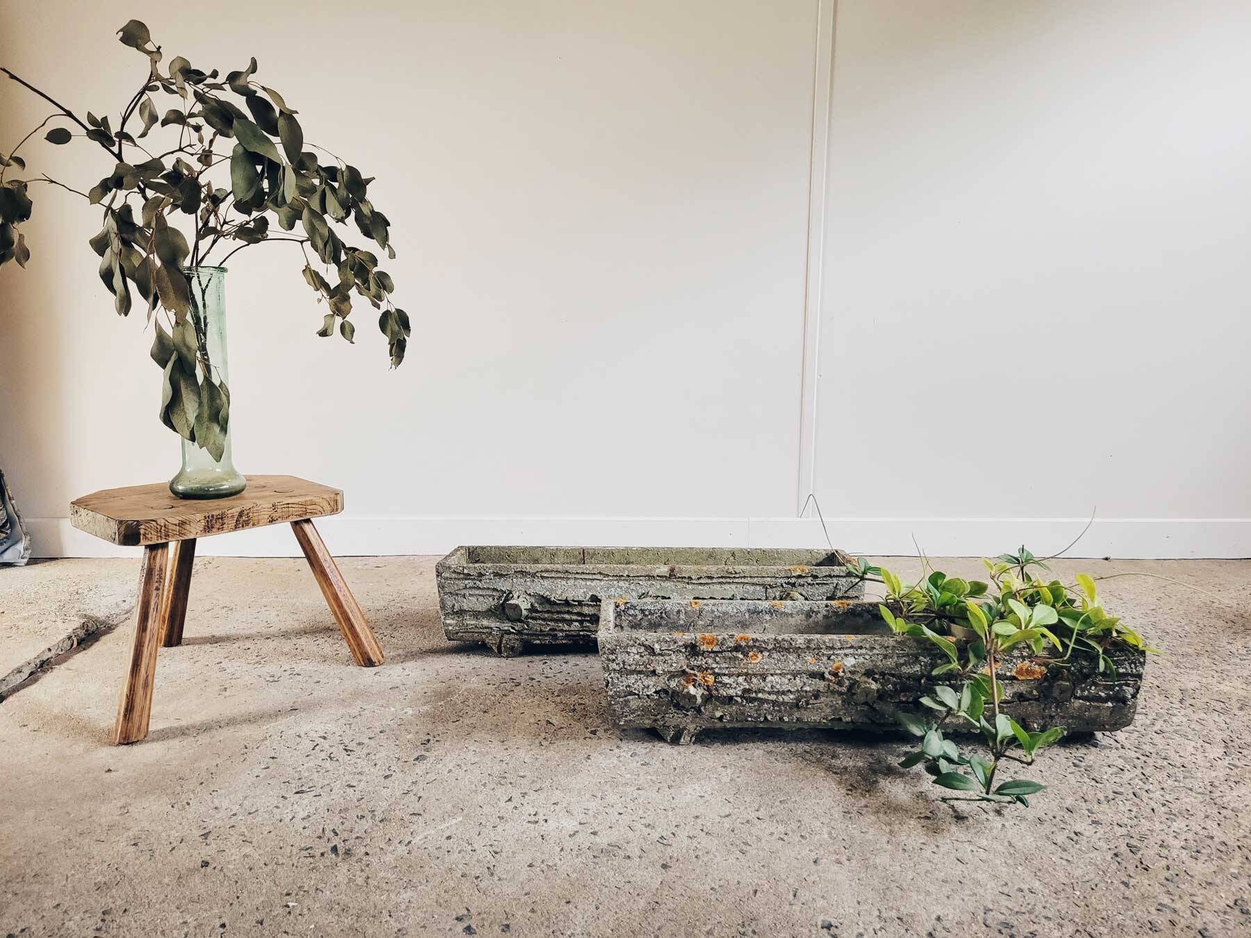 Old planters in faux cement wood