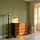 Antique walnut commode with bronze handles in the shape of a lion's mask,