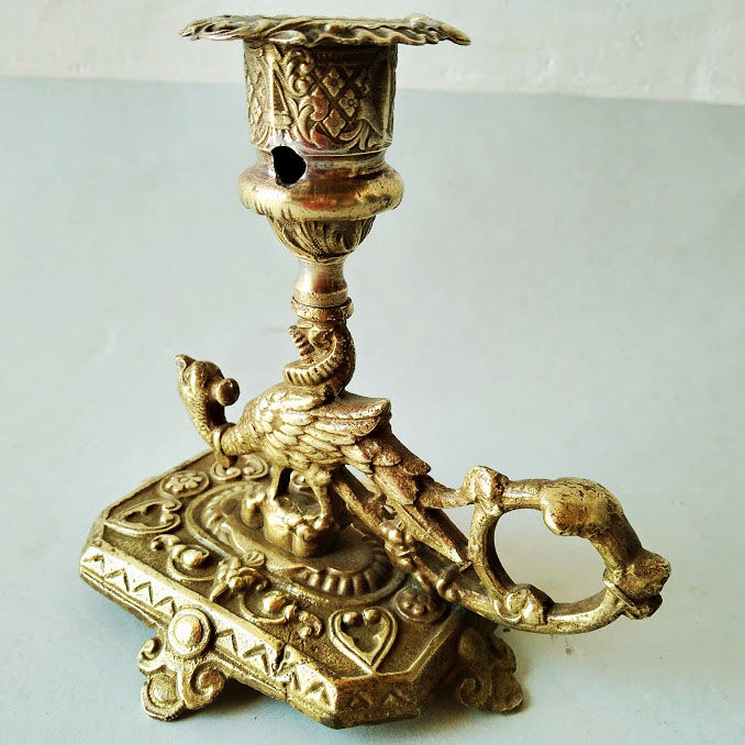 Bronze cellar rat candlestick