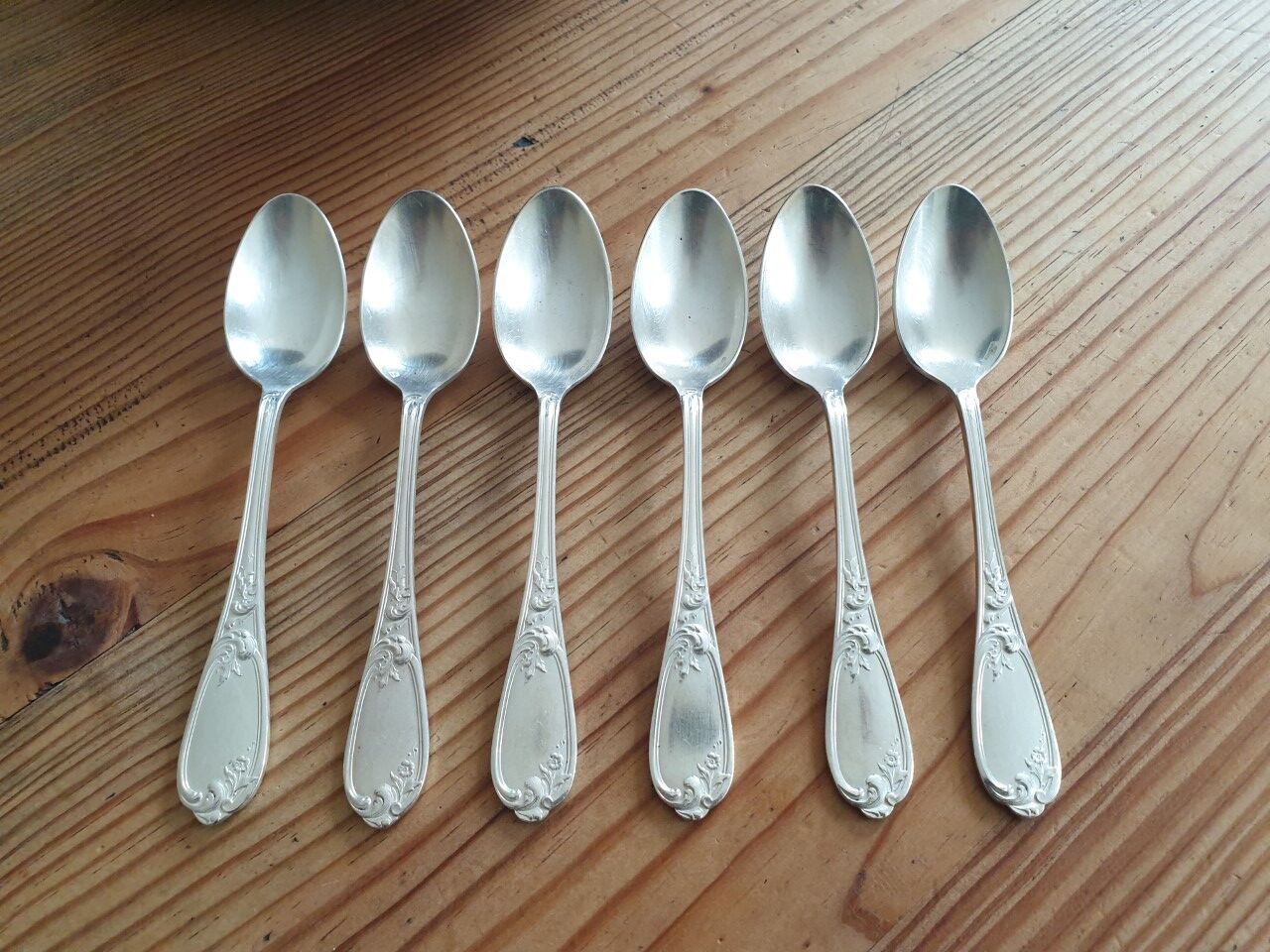 Small old silver metal spoons