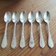Small old silver metal spoons
