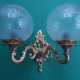 Pair of large double-light wall sconces in vintage brass and glass
