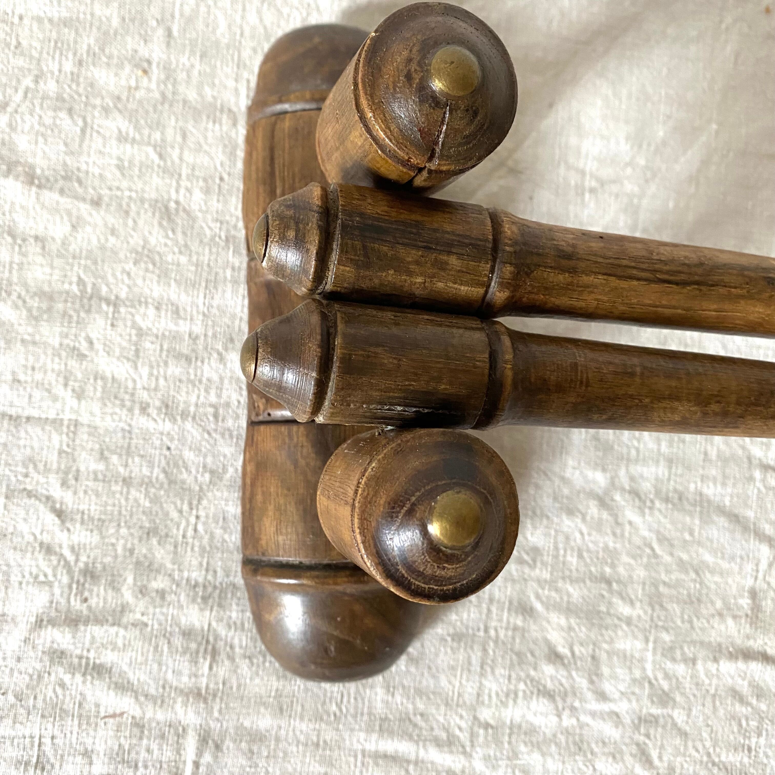 Turned wooden towel rack