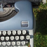 Typewriter blue japy script  with manual and carrying case