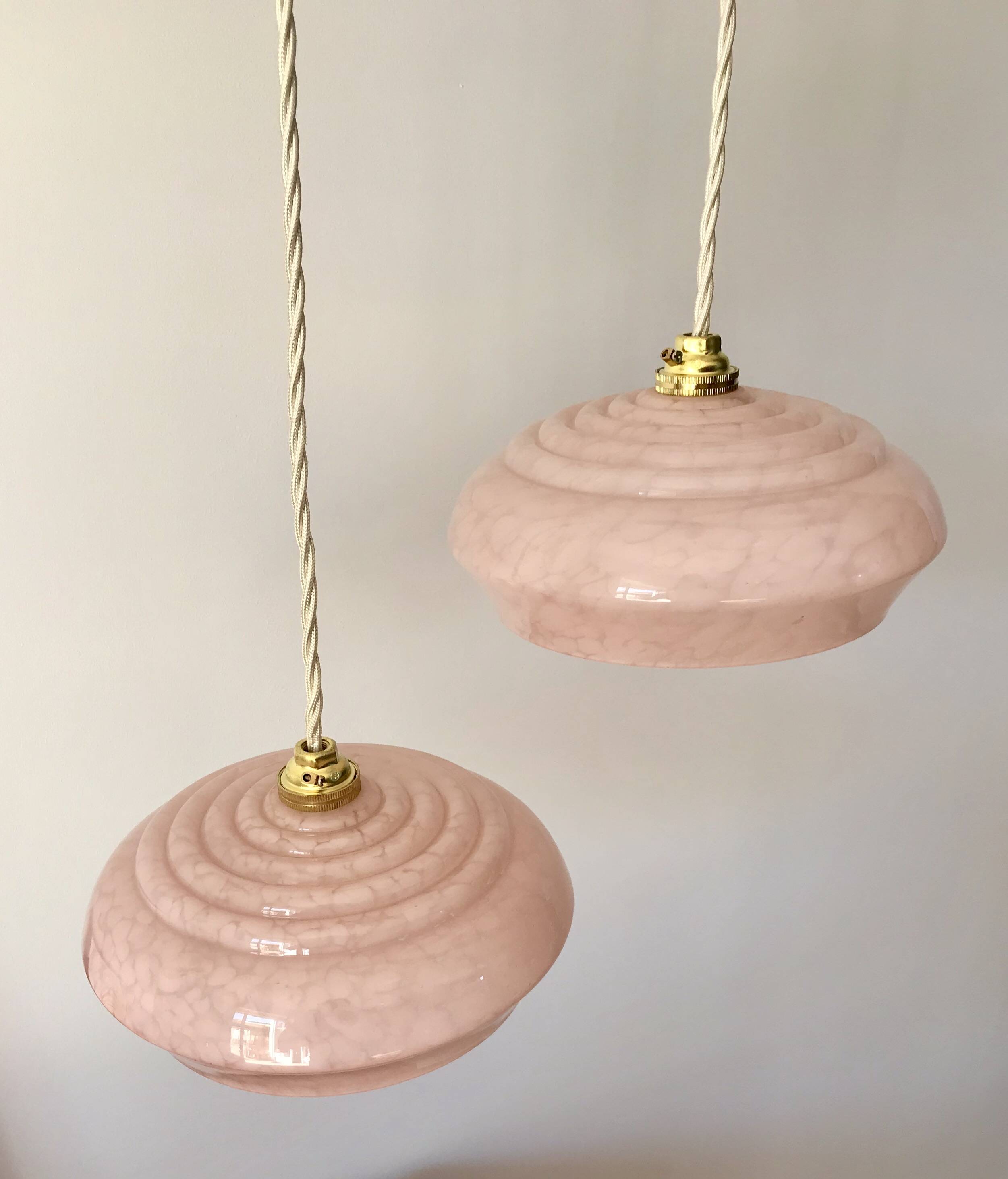 pair of candy pink Clichy glass pendant lights from the 1950s