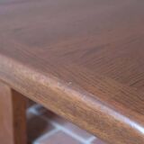 Large solid retractable coffee table