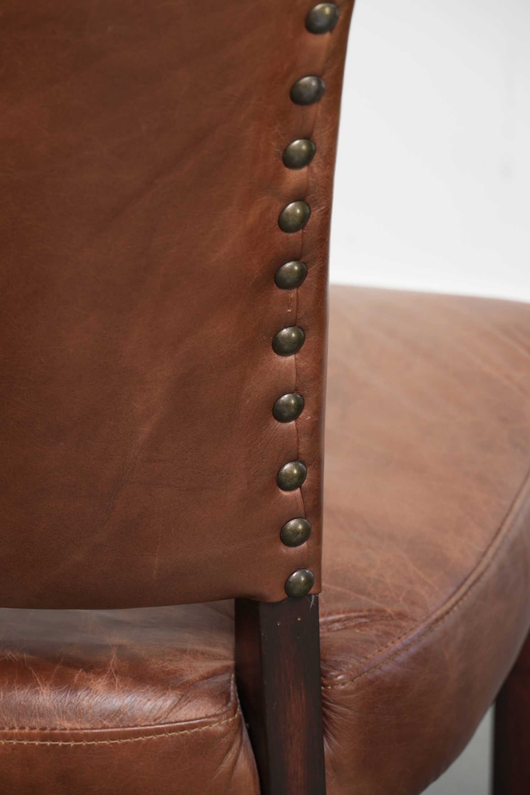 Set of 4 cognac-coloured cowleather dining chairs with decorative nails