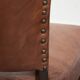 Set of 4 cognac-coloured cowleather dining chairs with decorative nails