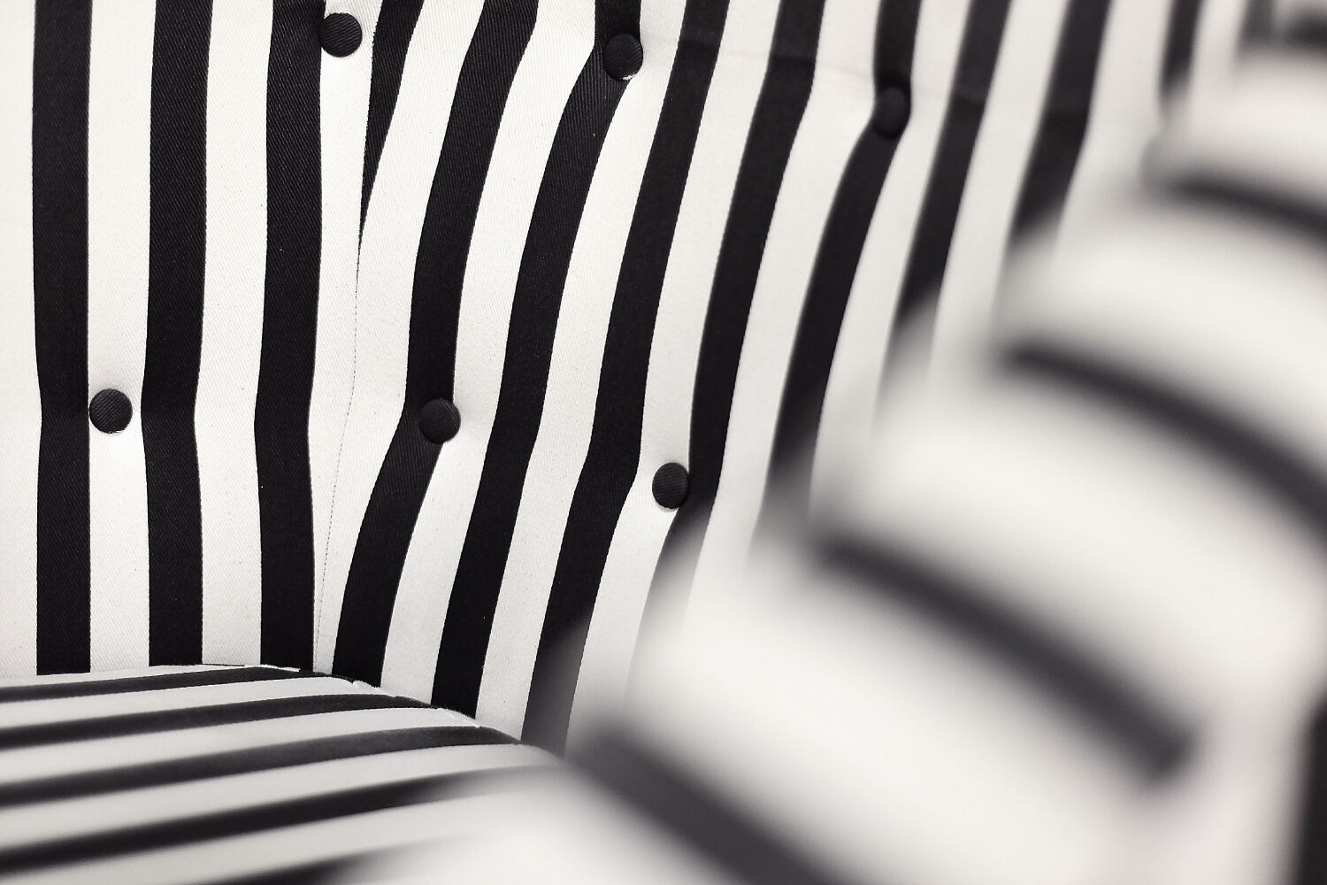 Mid-century modern Scandinavian rounded armchairs with black and white stripes, 1960s.