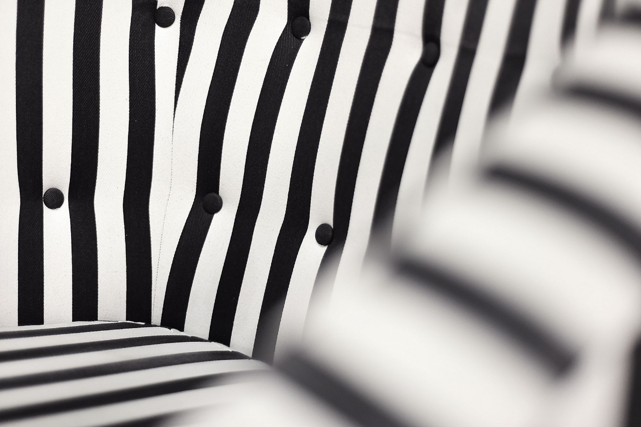 Mid-century modern Scandinavian rounded armchairs with black and white stripes, 1960s.