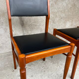 2 wooden and faux leather chairs in Scandinavian style