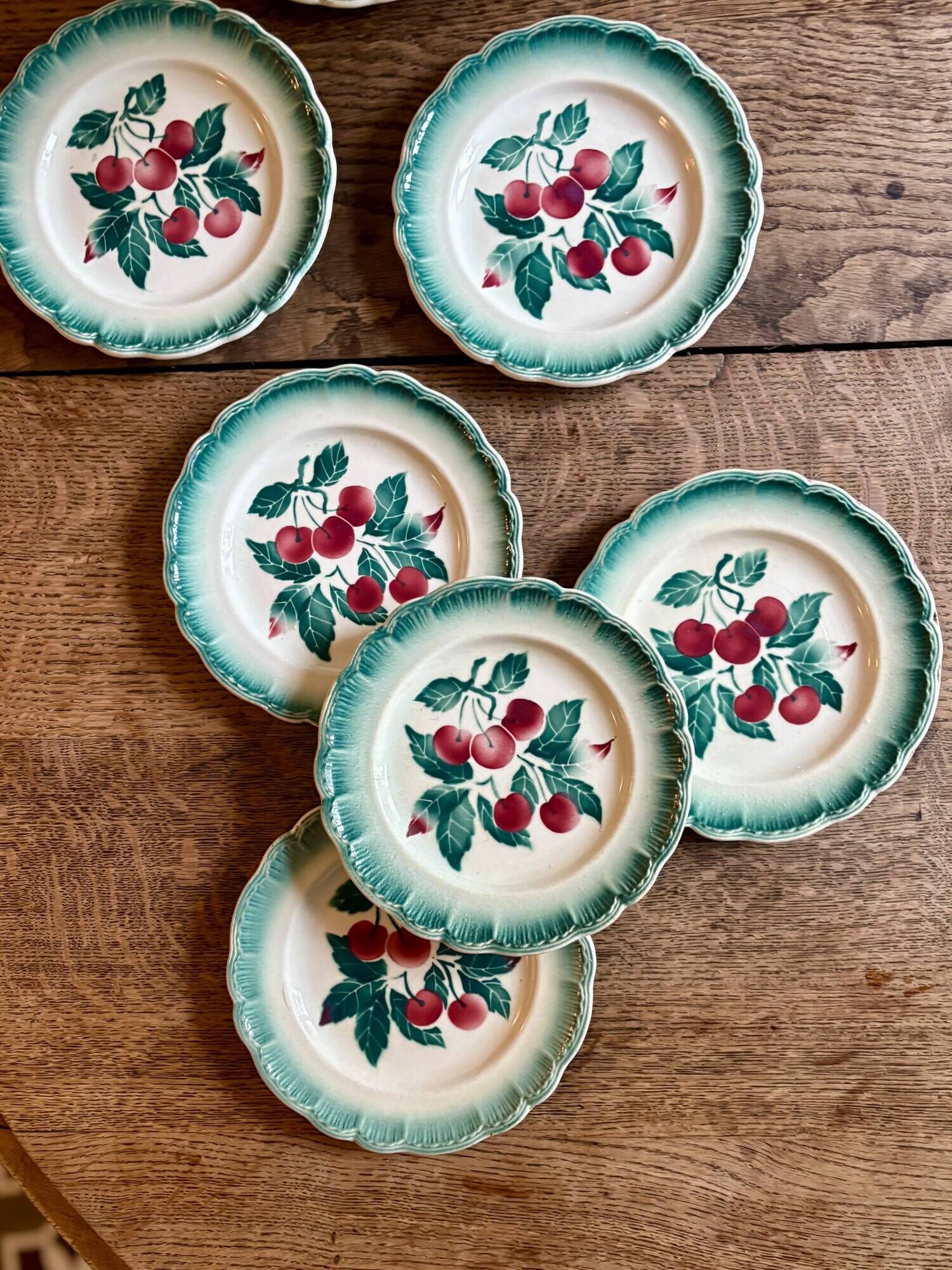 Set of 7 vintage Badonvilier dessert plates.